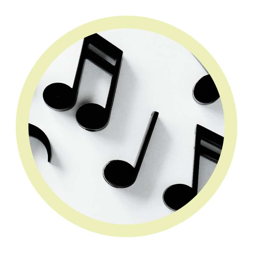 Music notes in a circle on a white background.