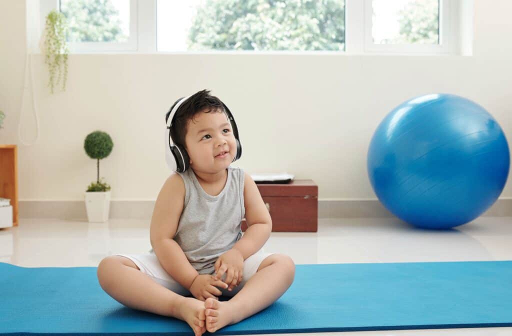 Child during sensory therapy listening to music