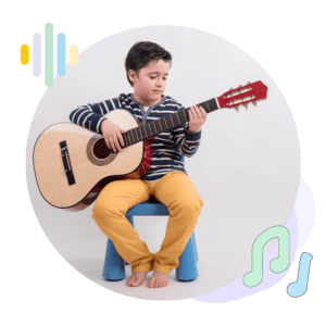 boy playing the guitar