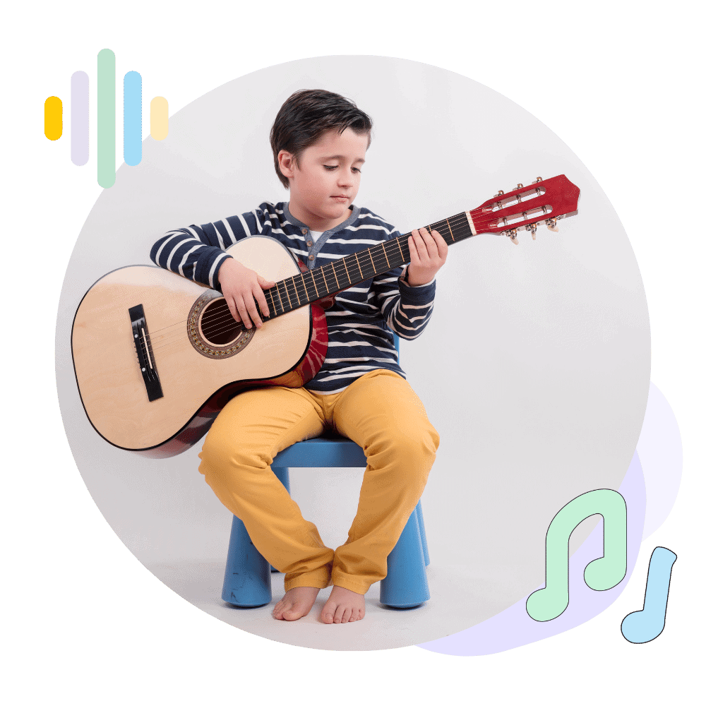 boy playing the guitar