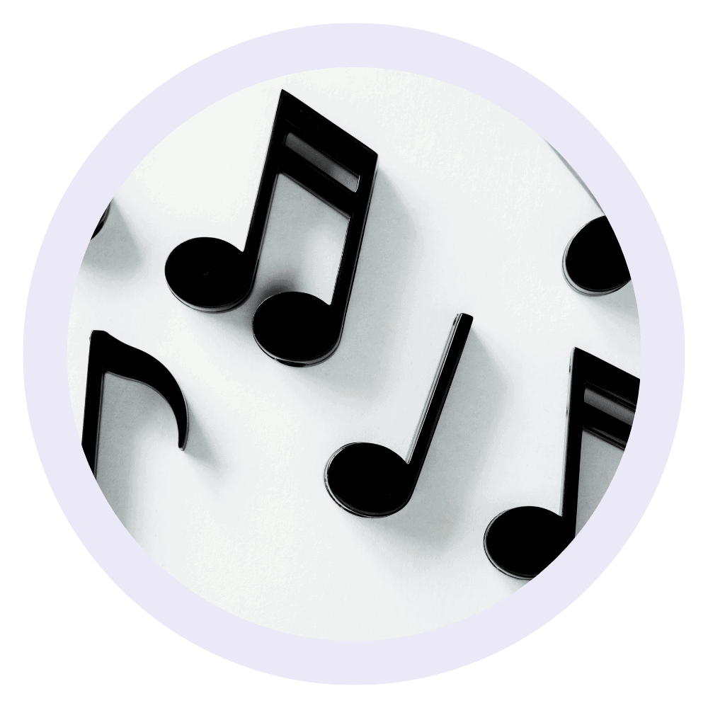 music notes in light purple circular border