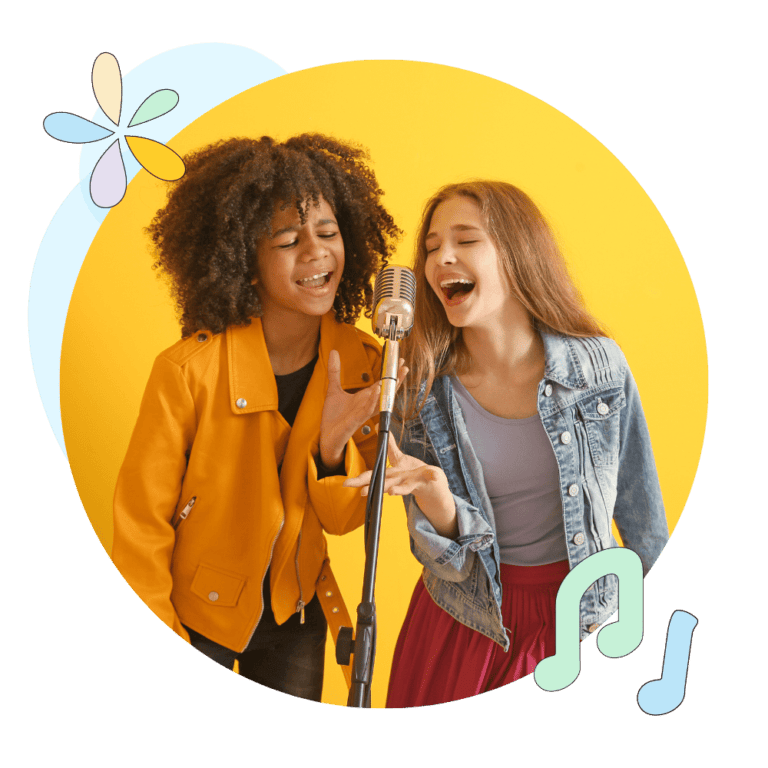 two girls singing into mircophone