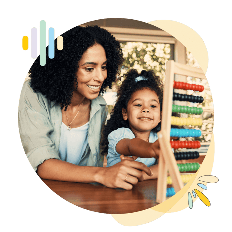 Preschool Homeschool Curriculum Mom and child at table working on learning activity