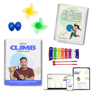 Shakers, scarves, a xylophone, and CLIMB Curriculum books and online pages.