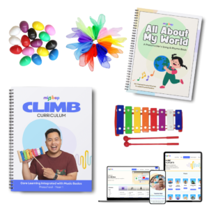 Shakers, scarves, a xylophone, and CLIMB Curriculum books and online pages.