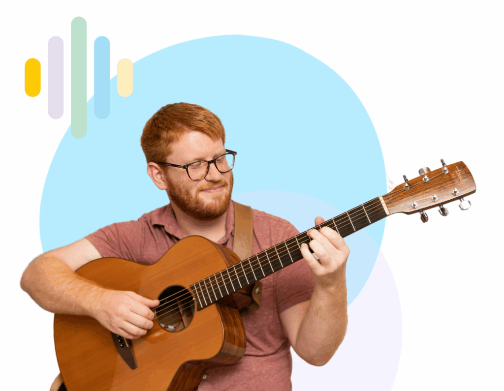 a music teacher holding a guitar