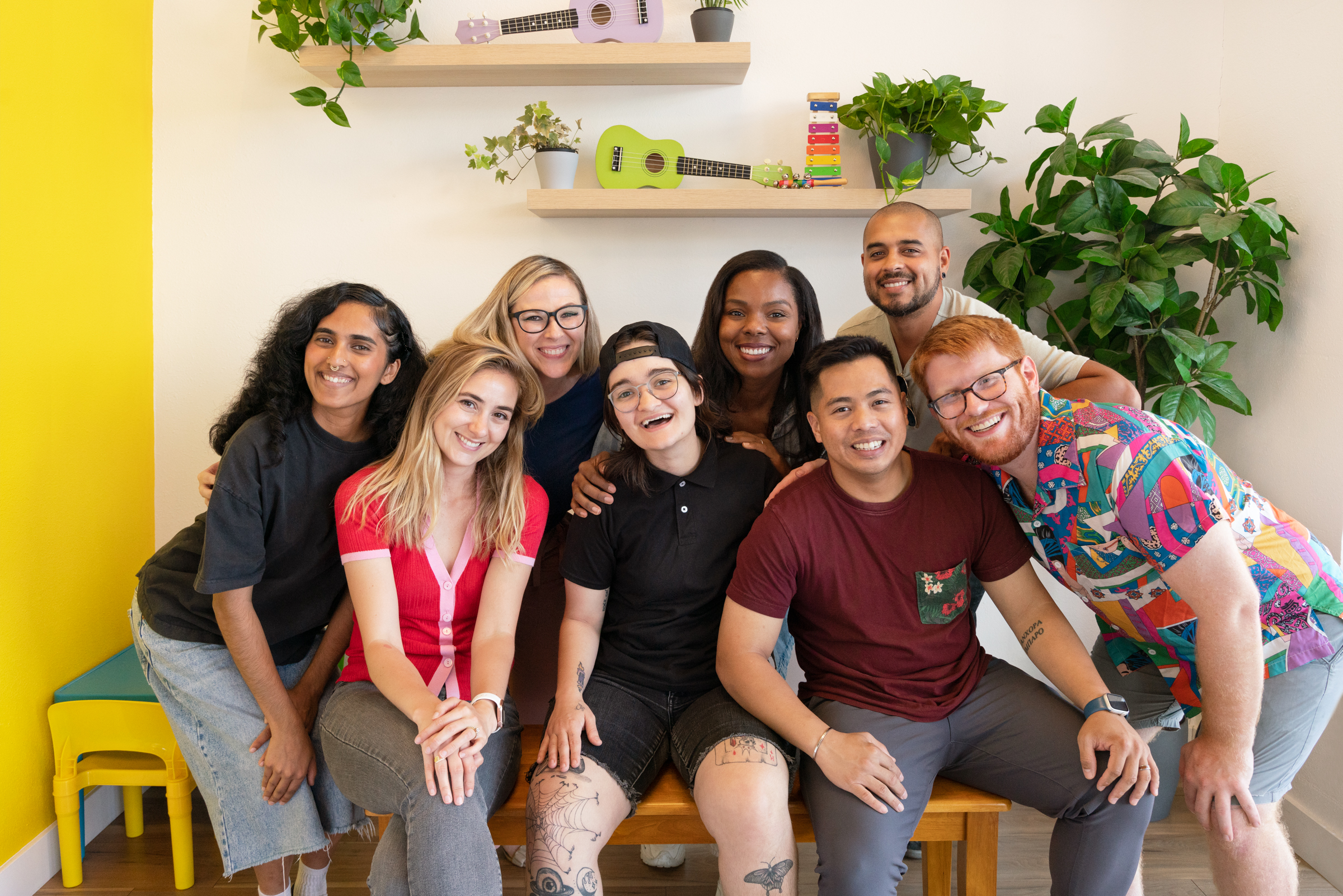 Eight Minibop Employees in The Minibop Studio Lobby